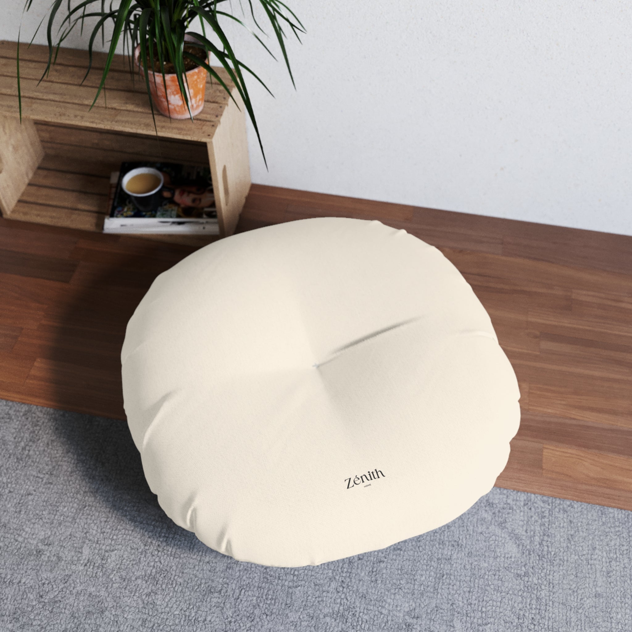 Coussin de sol rond touffeté dans salon avec plante — idée déco salon cosy, décoration maison bohème, dco maison zen, idée aménagement salon moderne